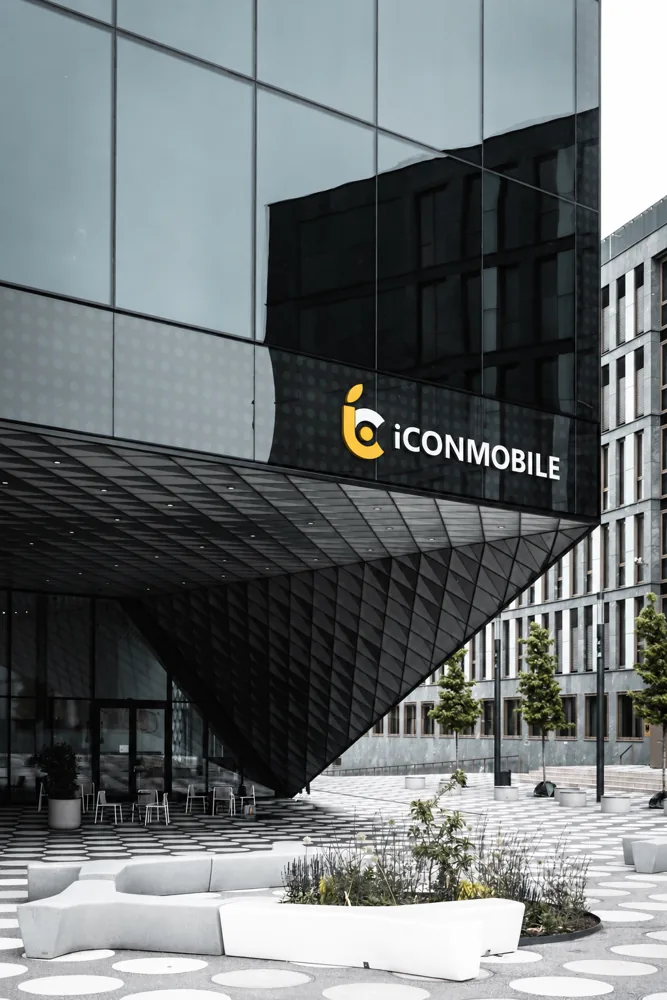 iCONMOBILE logo applied to a glass building façade